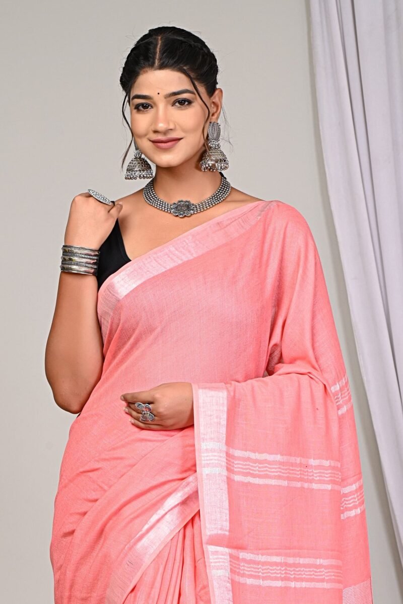 ## Coral Pink Linen Saree